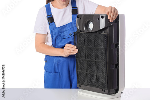 Female technician changing ...