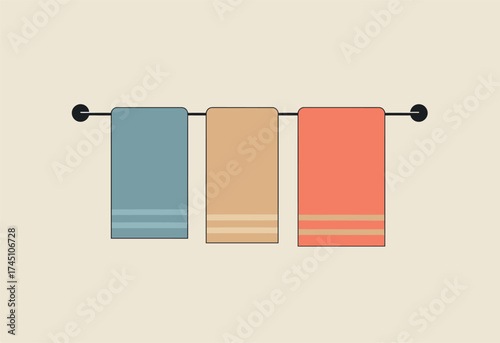 Three Colorful Towels on a Towel Bar