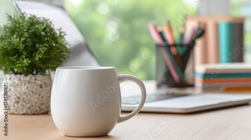 Inviting Cozy Desk Scene Featuring a Mug, Potted Plant, Laptop, and Stylish Office Decor Elements