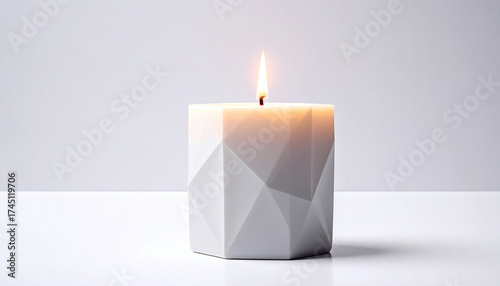 Polygonal Christmas candle on a white background showcasing geometric holiday design, modern 3D festive illustration, and minimalist digital art style