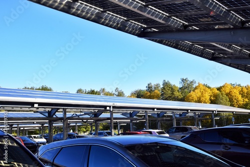 Solar panels are installed on the roof of the parking lot.