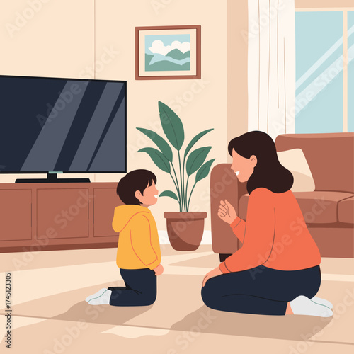 A mother and her young son are in the living room interacting and having a conversation about something important.