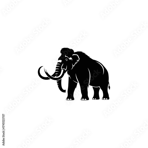A silhouetted mammoth, a large, extinct mammal with curved tusks, stands