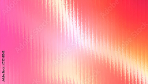 Ribbed glass surface with glowing pink orange gradient abstract background