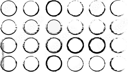 Collection of twenty four black and white circle ring shapes with varying textures and imperfections