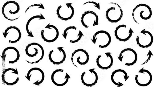 Collection of black grunge arrows pointing in different directions and circular shapes on white background