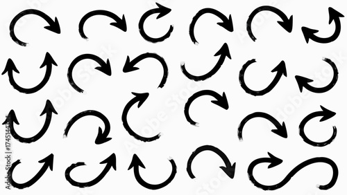 Collection of hand drawn black arrows pointing in various directions on a white background design element