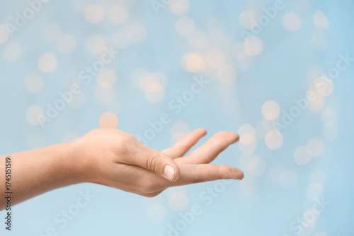 Open hand gesture offering ...