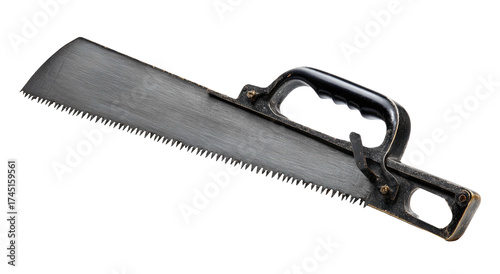 An isolated, close-up view of a handsaw with a black handle against a black background