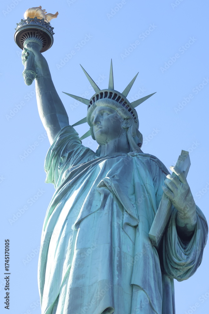 Fototapeta premium Statue of Liberty at sunset in New York City, USA