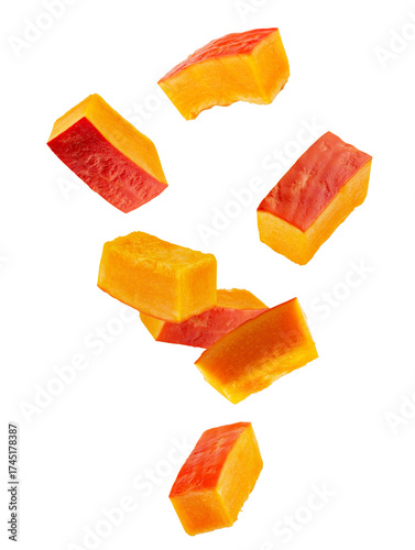 Rectangular slices of red pumpkin falling through space. Isolated on white.