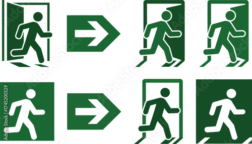 Set of green and white running man exit signs and directional arrows for safety