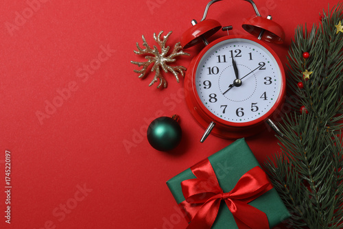 Festive scene with wrapped gifts, candies and decorations, sometimes on a bright red background, conveying Christmas greetings and celebration
