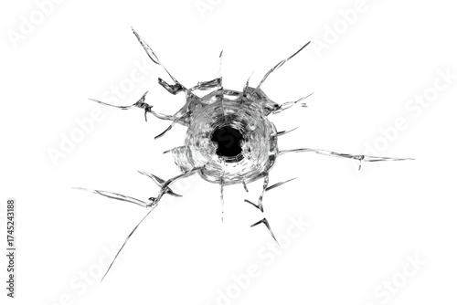 A close-up, high-contrast image of a bullet hole shattering a transparent surface