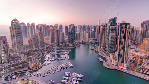 Canvas Print Dubai marina harbor panorama from night to day transition timelapse