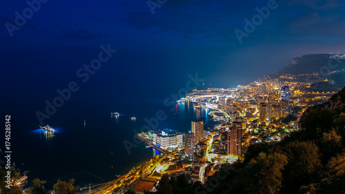 Aerial top view of Monaco from the grand corniche road day to night timelapse, Monaco France