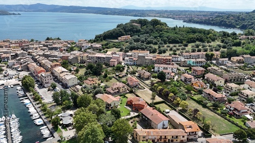 Canvastavla Drone aerial view of Capodimonte, Lazio, overlooking Lake Bolsena with charming