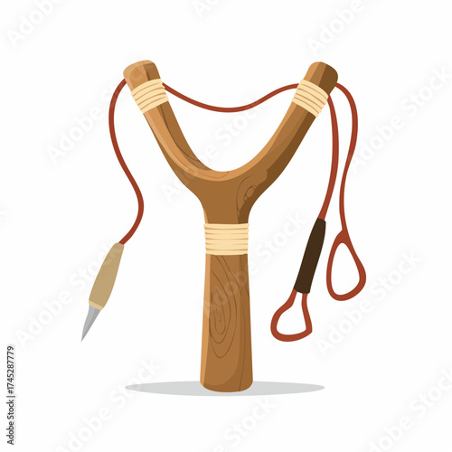 Wooden slingshot with projectile and elastic band