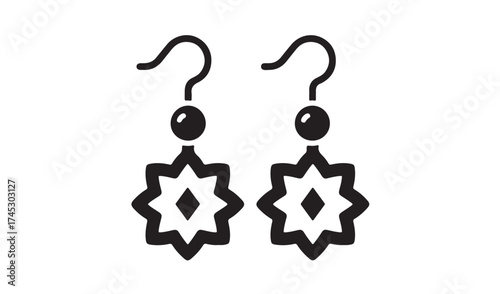 Pair of ornate dangle earrings isolated on white background