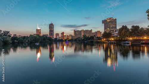 Canvas Print Vienna international center skyscrapers with Kaiserwasser lake reflection view d