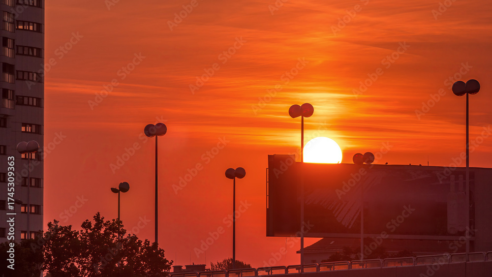 Obraz premium Sunrise near Donaustadt Danube City modern quarter with skyscrapers and business centres timelapse in Vienna, Austria.