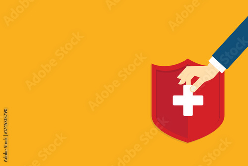 Medical healthcare insurance. Red shield on patient protection policy and pen. Medicine symbol.	