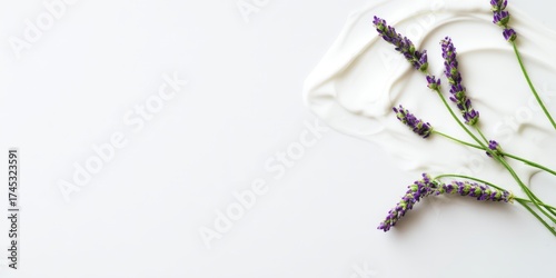Lavender flowers with natural cosmetic cream on white background