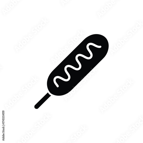 Isolated Black Corn Dog on Stick with Swirls Against Transparent BG