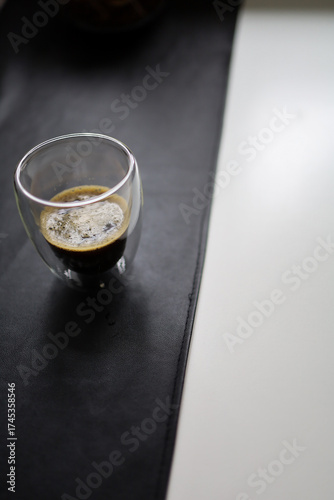 black coffee in a glass on the table