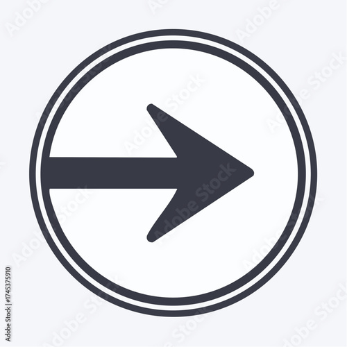 A dark grey arrow pointing to the right, enclosed within a double-lined circular border.
