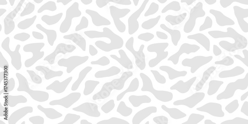 Abstract vector organic pattern. Minimal seamless texture with organic cut-out shapes, spots, cells. Simple trendy background. Subtle grey and white repeat design for print, decor, textile, packaging