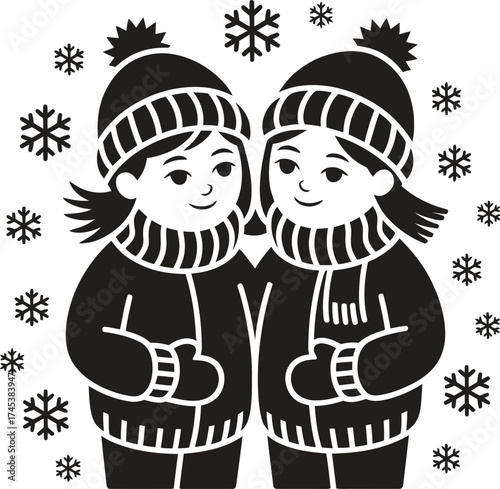 Two children wearing winter hats and scarves in the snow