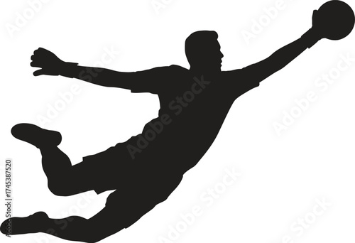 Silhouette of a football player jumping to catch a ball