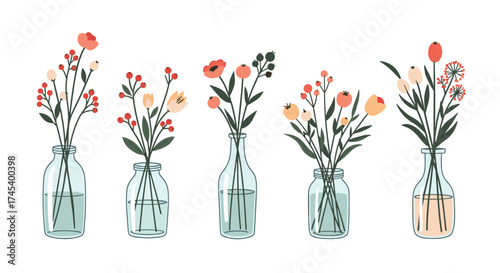 A collection of small wildflower bouquets in glass vases.