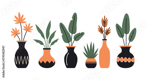 A collection of decorative potted plants in ceramic vases.