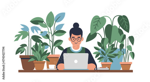 Young woman happily working on her laptop in a cozy home office surrounded by various houseplants, conveying productive remote work and a love for nature.