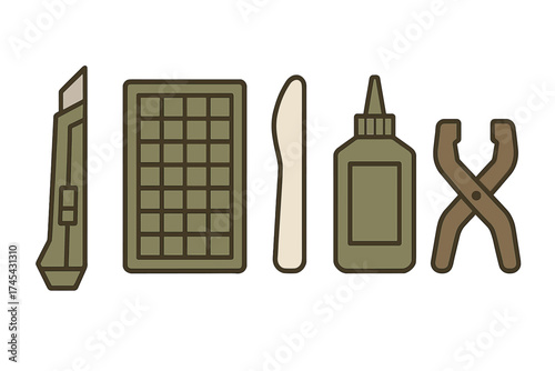 Essential supplies for detailed hobby crafting and model making including cutter, mat, glue, and pliers