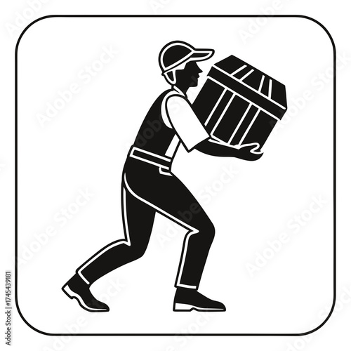 Delivery person wearing a cap and overalls carrying a large cardboard box with both hands