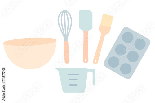 Assortment of kitchen baking equipment including bowl, whisk, spatula, measuring cup, and silicone mold