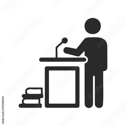 Silhouette of person speaking at podium with books