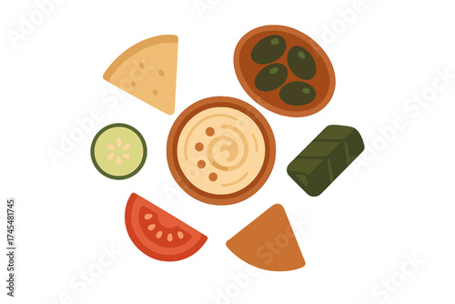 Traditional Mediterranean appetizer platter featuring hummus, pita chips, olives, and fresh vegetables