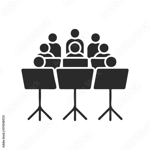 Silhouette of orchestra performing with music stands and musicians