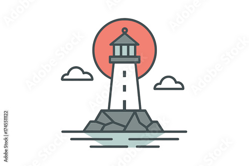 Coastal lighthouse structure standing on rocks near the ocean under a large setting sun