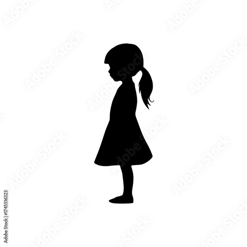 Silhouette of a young girl in a dress, child in profile, innocence and childhood beauty