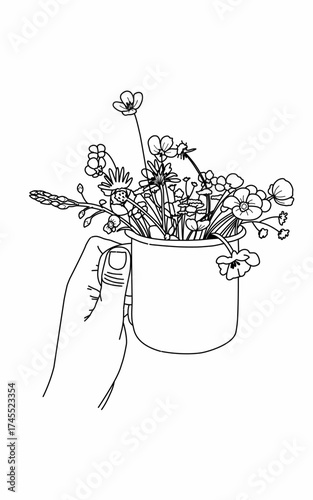 Black and white sketch illustration of a flower in a mug