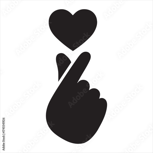 Black silhouette of a hand making a finger heart gesture with a heart above it