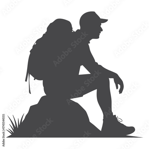 Silhouette of a hiker sitting on a rock with a backpack silhouette