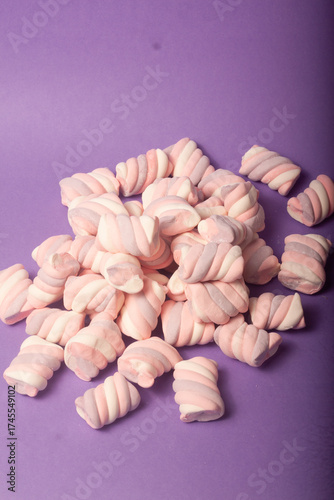 marshmallows on a purple backround
