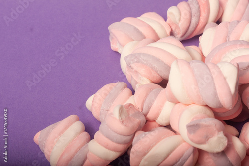 marshmallows on a purple backround
