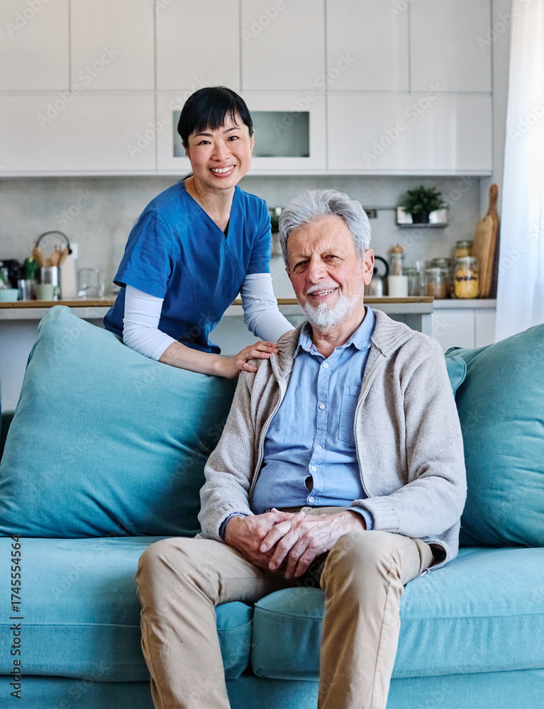 Fototapeta premium Doctor or nurse caregiver with senior man talking and having fun at home or nursing home